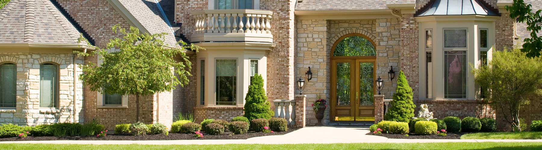 Home Insurnace represented by view of front of a house from the street